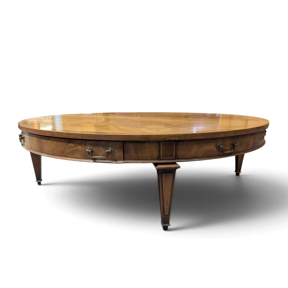 Circa 1957 Heritage Round Mahogany Coffee Table with Drawer