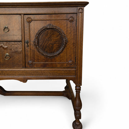 Antique Jacobean Revival Figured Wood Sideboard with Carved Medallions