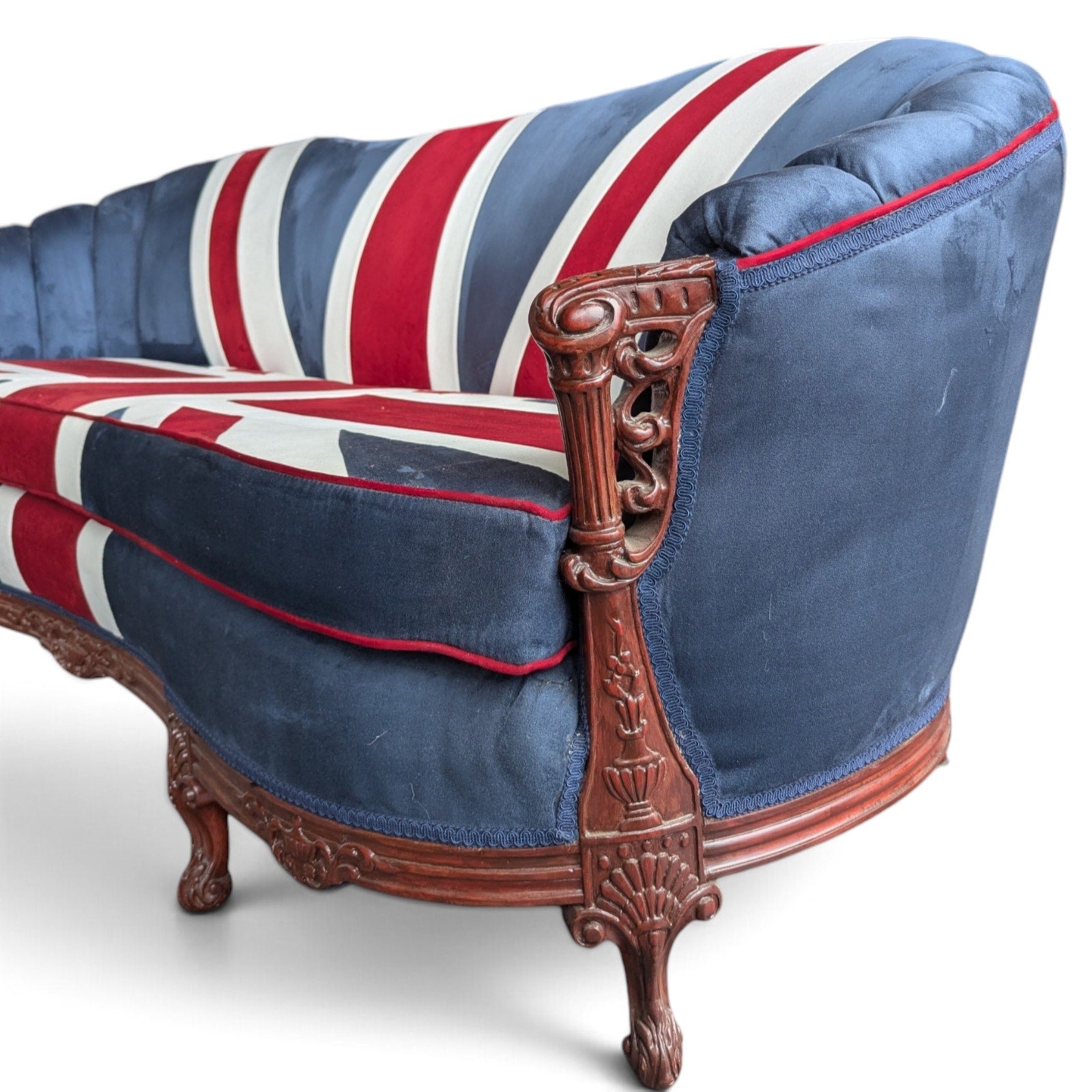 Vintage Union Jack Upholstered Sofa with Ornate Carved Wood Frame — view 11 of 16