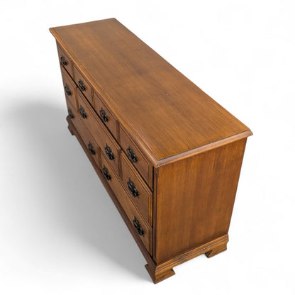 Vintage Traditional Nine-Drawer Wood Dresser With Bracket Feet
