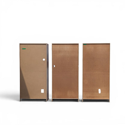 A trio of teak bookcases
