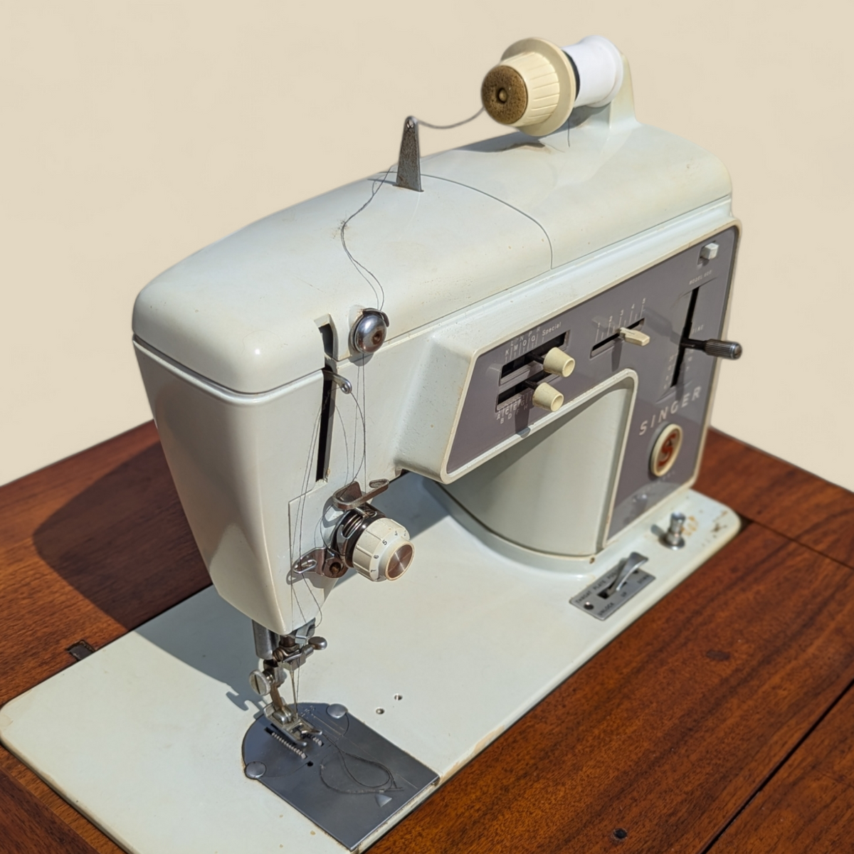 1966 Singer Slant-O-Matic 600 Sewing Machine in Mid-Century Wood Cabinet — view 8 of 18