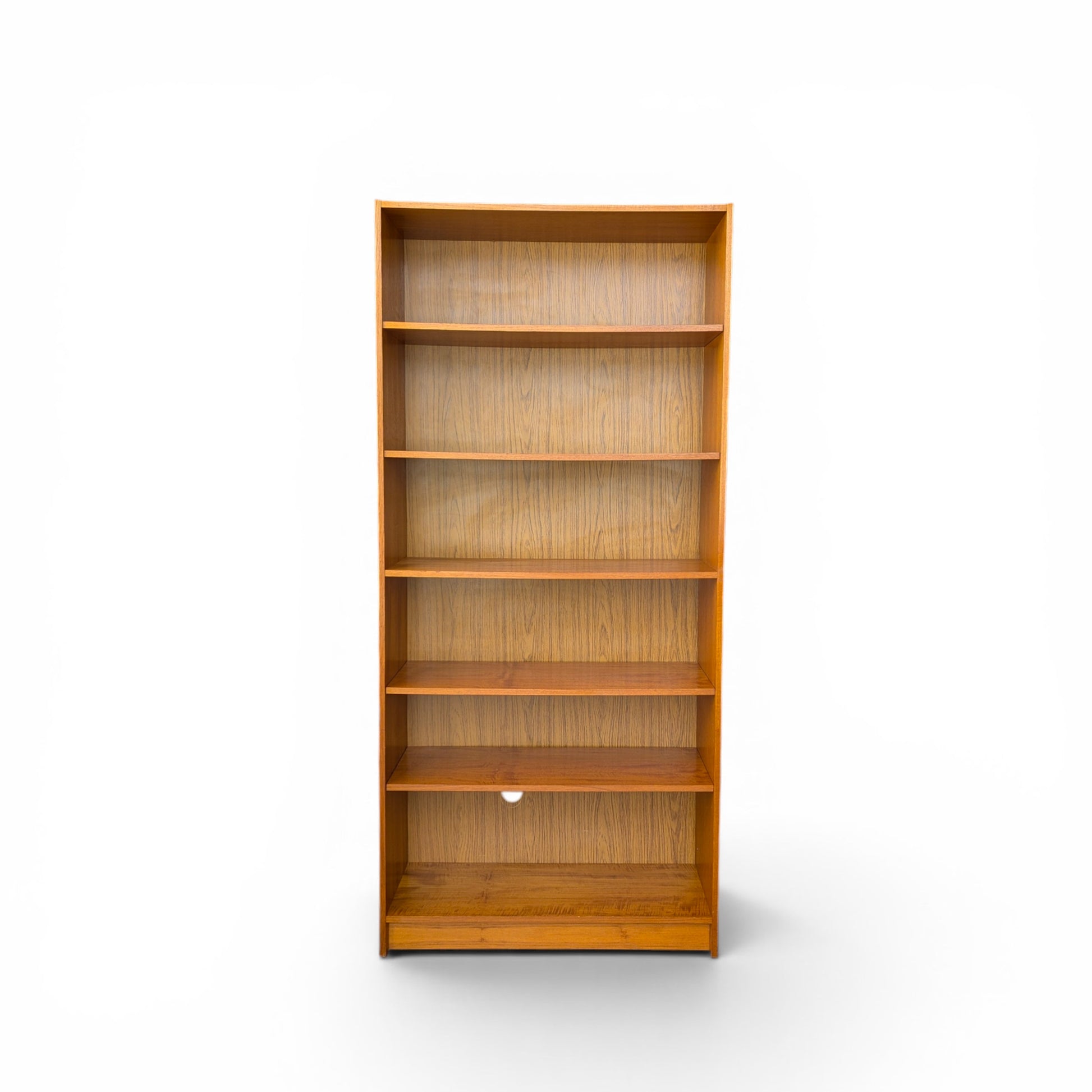 A trio of teak bookcases