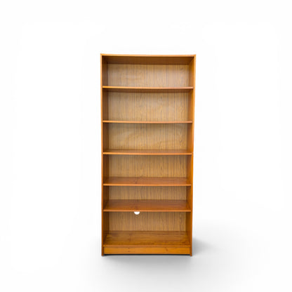 A trio of teak bookcases