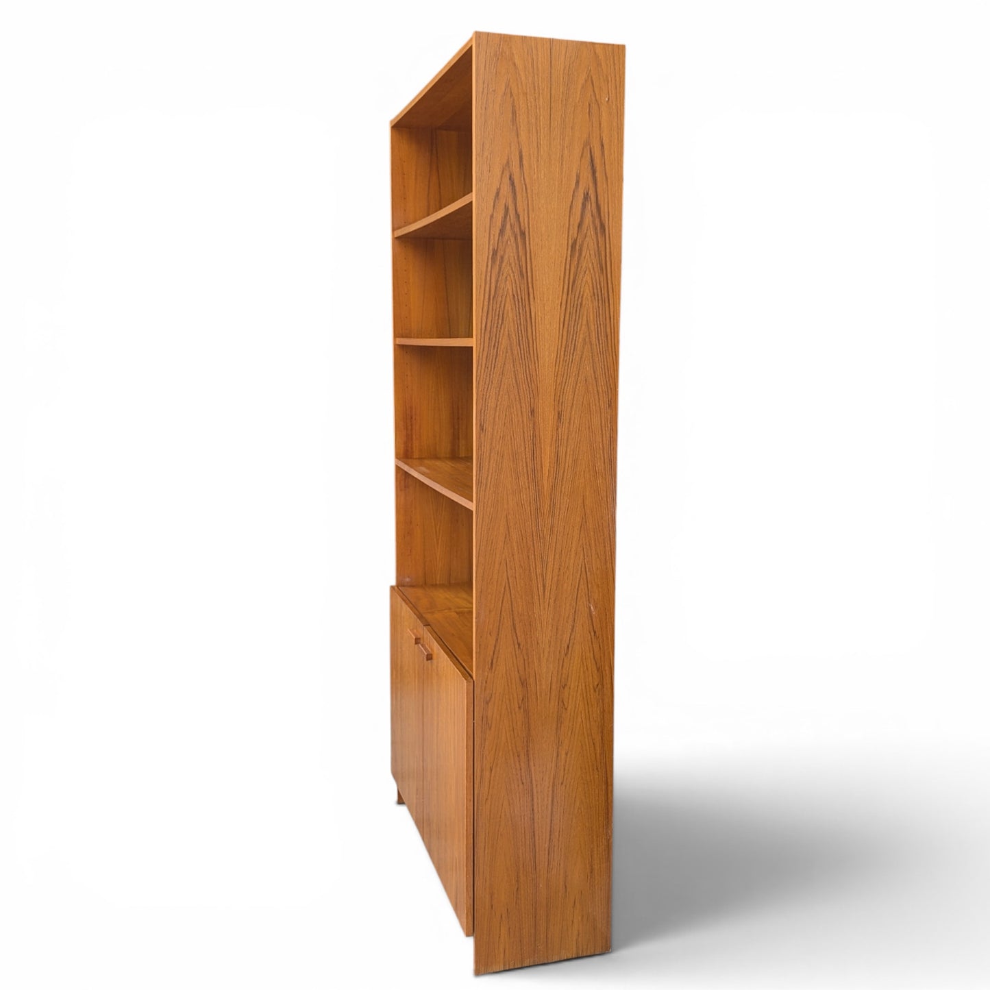 A trio of teak bookcases