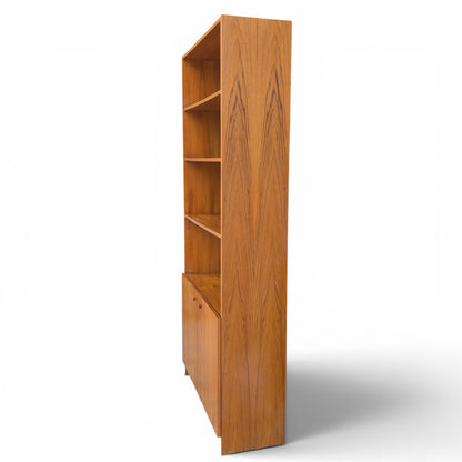 A trio of teak bookcases