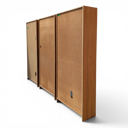 A trio of teak bookcases